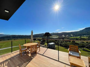 Casa Pôr do Sol com banheira de hidromassagem